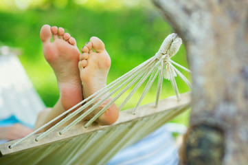 Hammock and woman feet