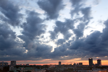 Warsaw modern skyline with stormy clouds. Poland.