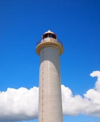 白亜の灯台と青空と雲