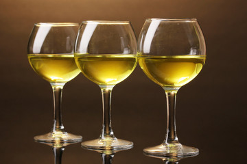Wineglass on brown background