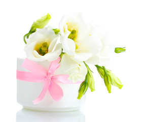beautiful spring flowers in vase isolated on white