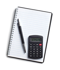 calculator and pen on blank notebook