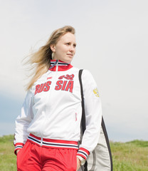 Portrait of sportswoman outdoors
