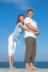 Attractive couple flirting outdoors