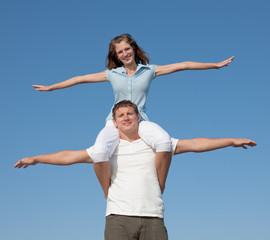 Attractive couple posing outdoors