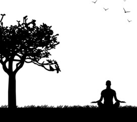 An isolated girl meditating and doing yoga exercise  in park