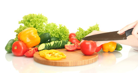 woman hands cutting vegetables on kitchen blackboard