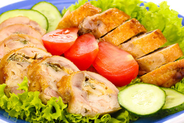 Tasty meat cutlet with garnish on plate close-up