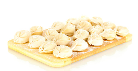 Raw Dumplings on cutting board isolated on white