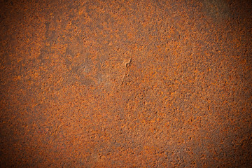 Dark edged rusty metal plate background