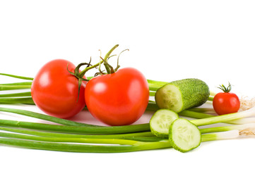 vegetables on a white background (cucumbers, tomatoes)