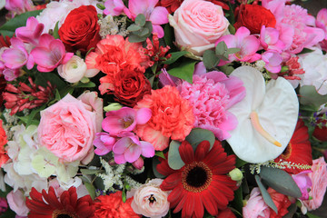 Mixed floral arrangement in red and pink