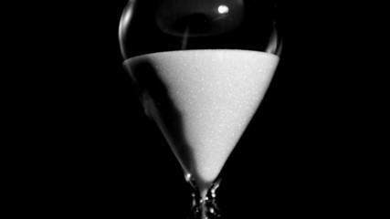 Sand clock in super slow motion emptying