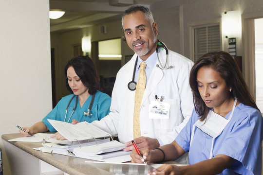 Doctor and nurses working in hospital