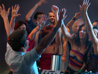 women flirting with dj in night club