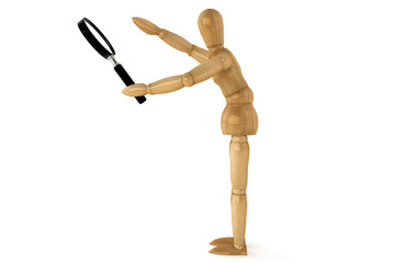 Wooden dummy with magnifying glass