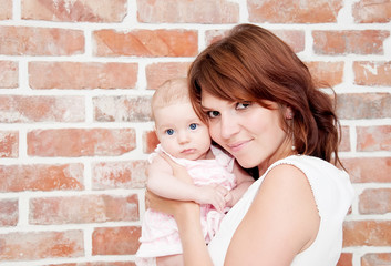 Mother holding sweet baby