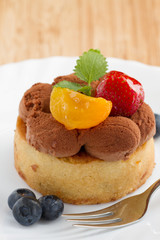 Fresh fruit tart with strawberries, blueberries and apricots