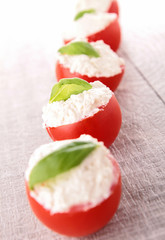 stuffed tomato with cheese and basil