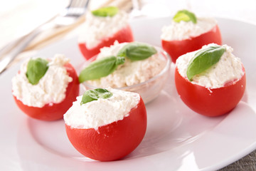 stuffed tomato with cheese and basil