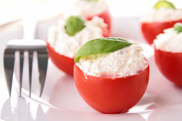 stuffed tomato with cheese and basil