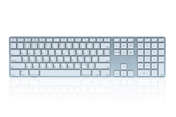 Modern aluminum computer keyboard isolated on white background