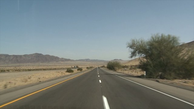Driving Shot on a Highway through the dessert