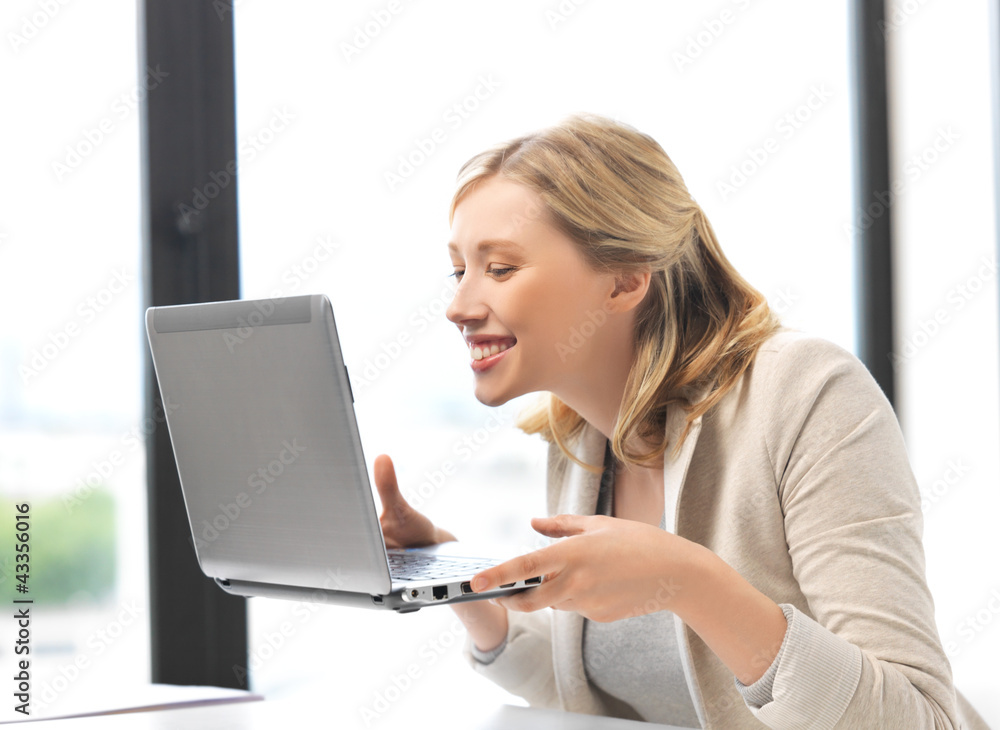 Sticker happy woman with laptop computer