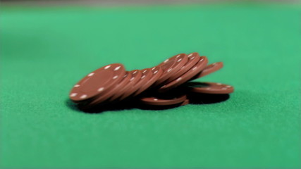 Brown chips falling in super slow motion - Powered by Adobe