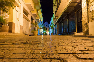 Narrow street at night in Old Havana