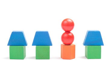 Toy houses made from wooden blocks