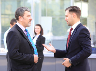 Fototapeta premium Business people discussing. Everyday setting