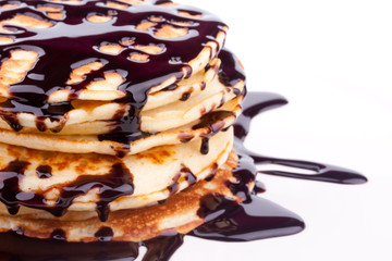 stack of pancakes with chocolate sauce