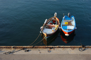 Fototapeta premium Colorful fisherman boats in marina, Elba, Tuscany, Italy