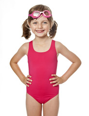 little girl wearing swimsuit isolated on white background © Vera Kuttelvaserova