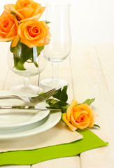 beautiful holiday table setting with flowers