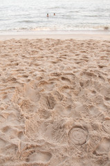 Footprint in the sand on a beach