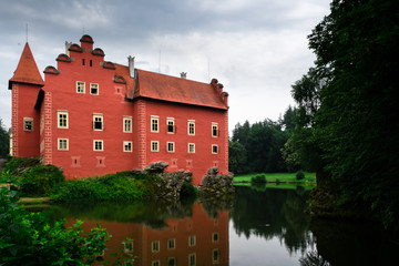 Naklejka premium Large red house on lake