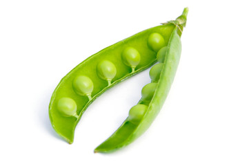 Fresh green peas isolated on white