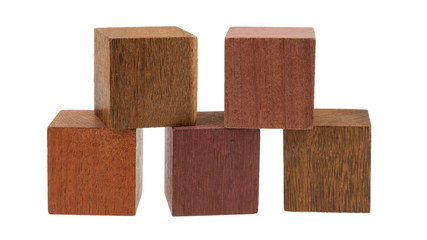 Several old cubes of wood, used by children for building