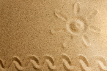 Fototapeta na wymiar Sun on sand on beach holiday background sign concept