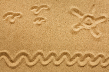 Sun on sand on beach holiday background sign concept