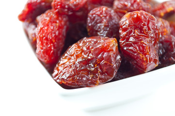 Italian sun dried tomatoes on white background.