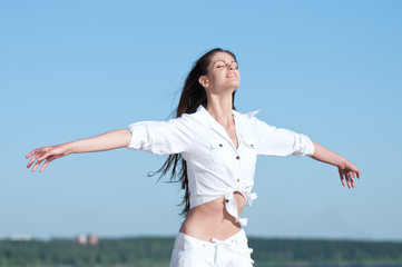 Sexy woman posing on the beach