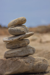 Fototapeta na wymiar man-made pile of rocks near Natural Bridge, Aruba
