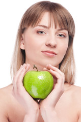 Young woman with green apple