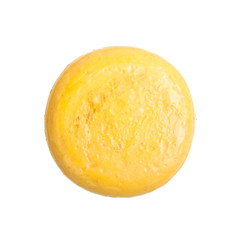 Whole cheese called "Uienkaas" (onioncheese) on a white backgrou