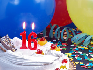 Birthday cake with red candles showing Nr. 16