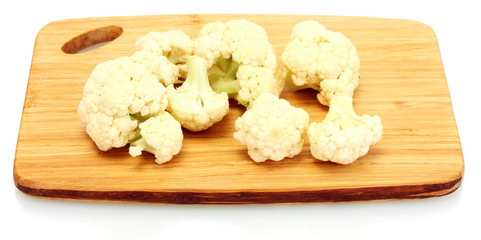 Fresh cauliflower on cutting board isolated on white