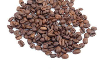 Heap of coffee beans at white background